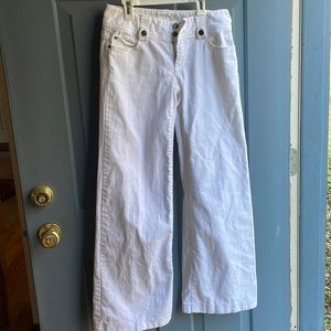 Pre-loved white jeans by Michael Kors in size 2.